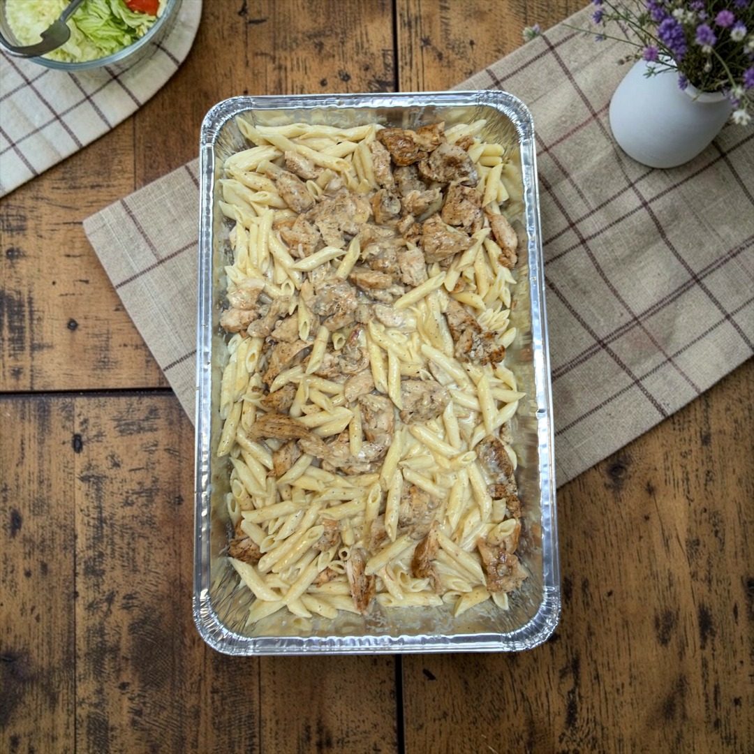 Catering tray of chicken penne pasta