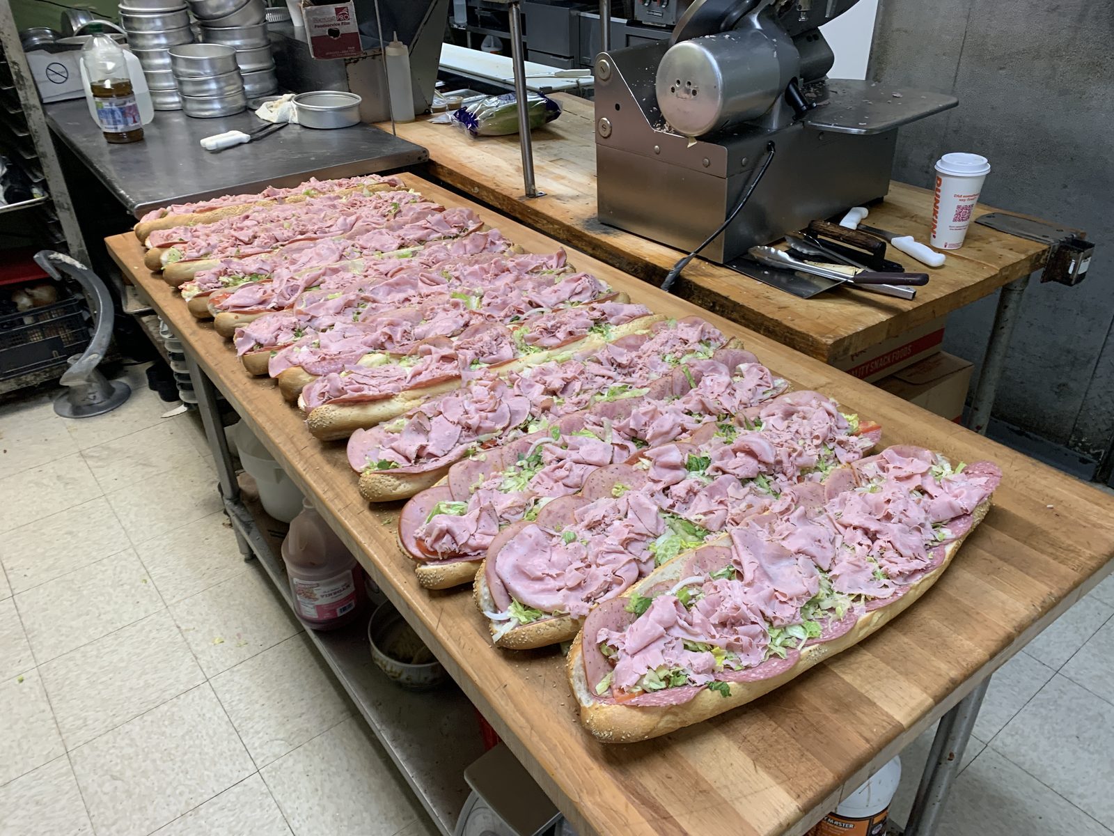 Dozens of fresh hoagies being prepared for a catering order in the Sciarrino's kitchen