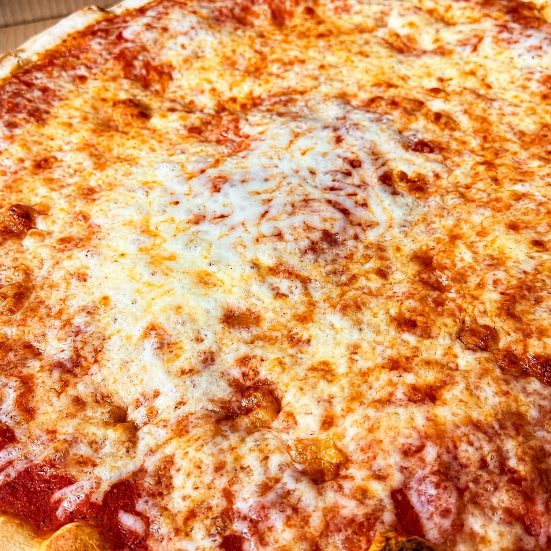 Large 18-inch boardwalk style cheese pizza in a box